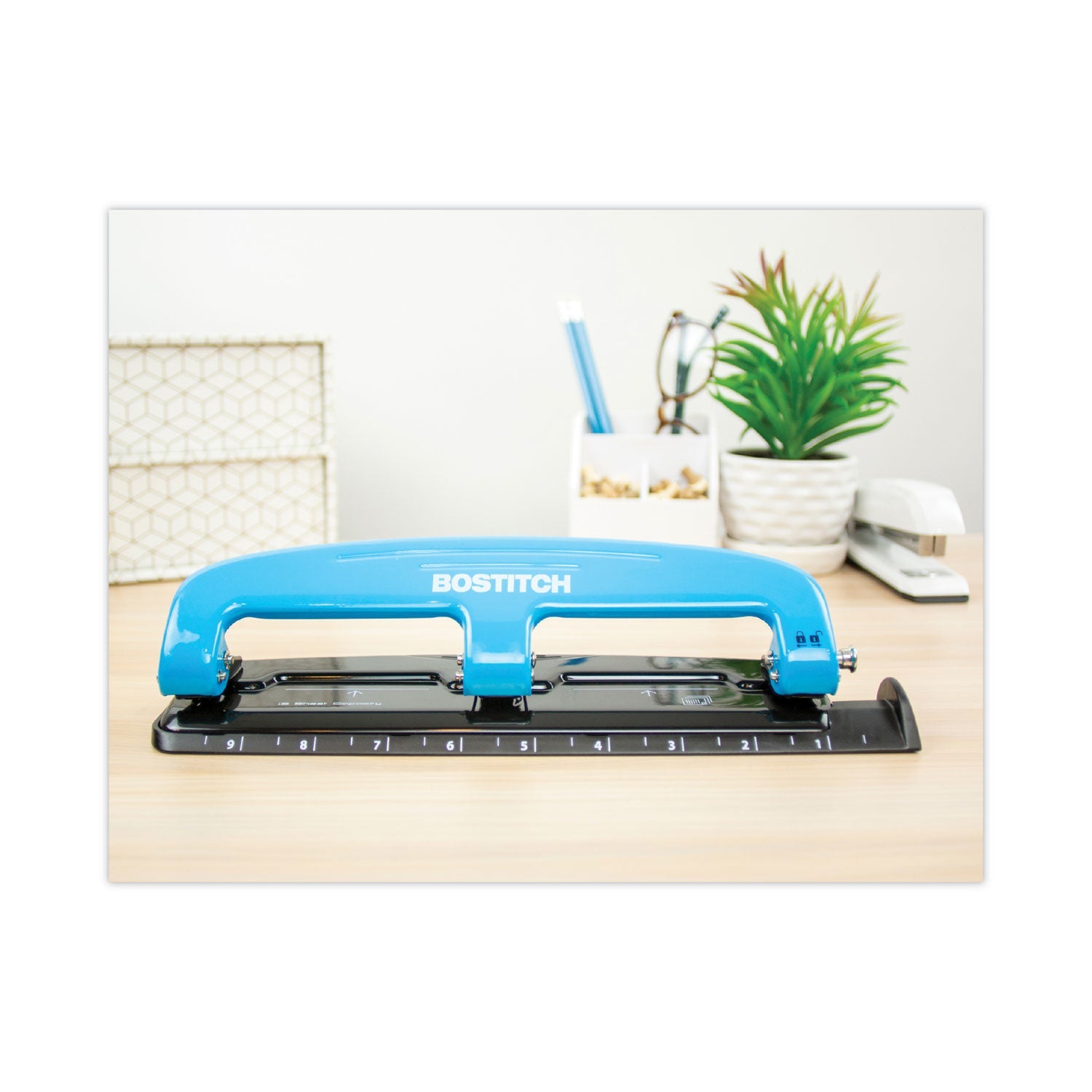 Bostitch® 12-Sheet Ez Squeeze Three-Hole Punch, 9/32" Holes, Blue/black